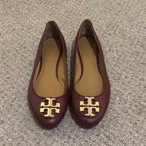 Tory Burch Maroon Flats with Gold Emblem